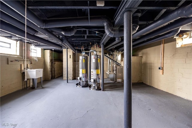 basement with sink and gas water heater