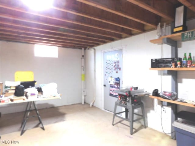 basement featuring a workshop area