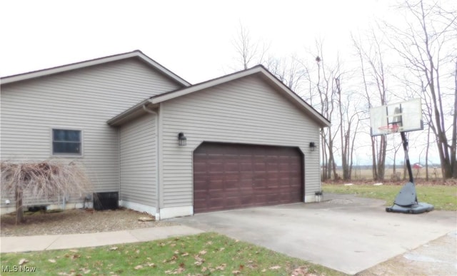 view of side of property featuring a garage