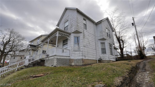 view of property exterior featuring a yard