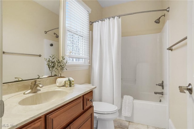 full bathroom with shower / tub combo with curtain, vanity, toilet, and tile patterned flooring