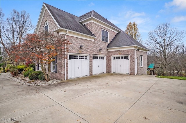 view of home's exterior with a garage