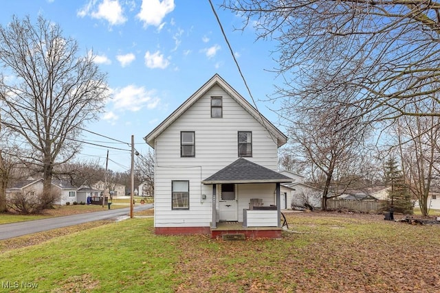 view of front of house featuring a front yard and a porch