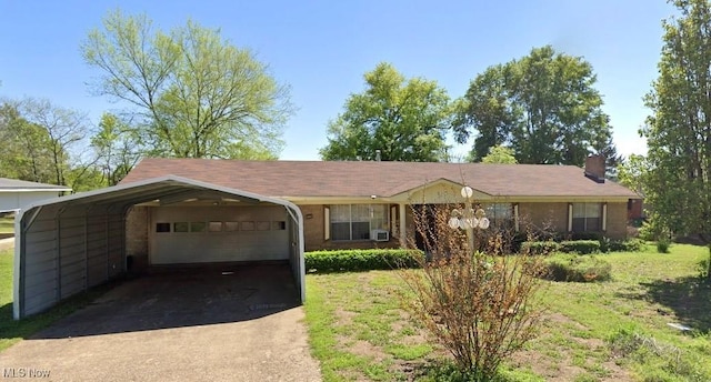 ranch-style house with a carport, a garage, and a front lawn