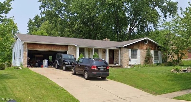 ranch-style home with a garage and a front lawn