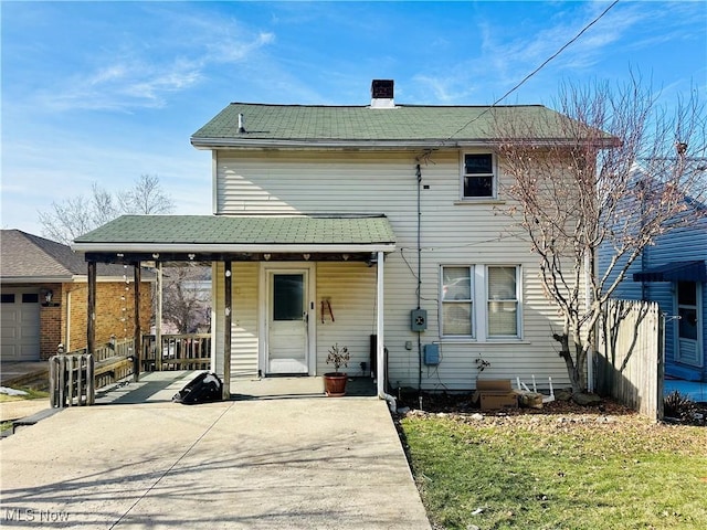 view of front of home with a porch and a front yard