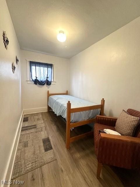 bedroom featuring hardwood / wood-style flooring