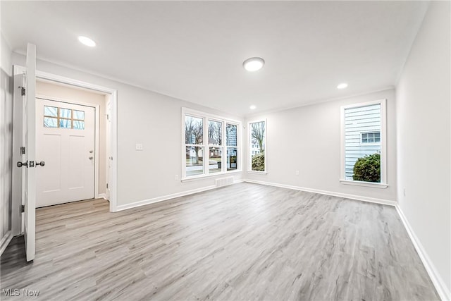 foyer entrance featuring light hardwood / wood-style floors