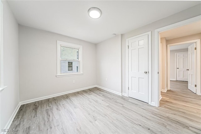 unfurnished bedroom featuring light hardwood / wood-style flooring