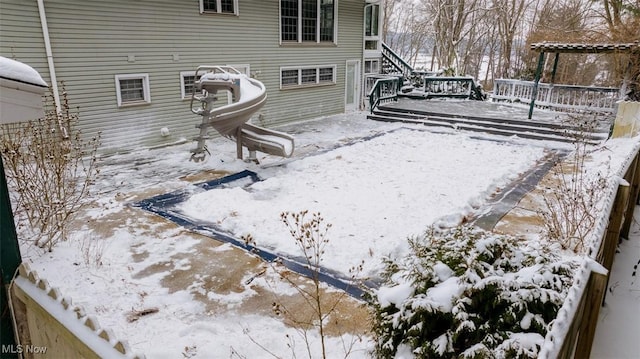 view of yard layered in snow