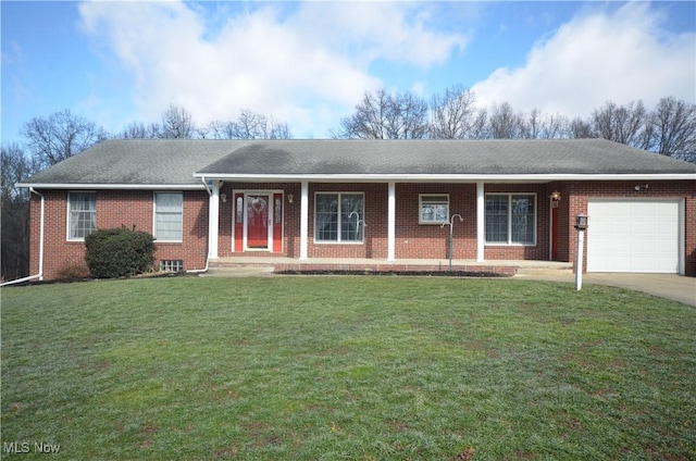 single story home featuring a garage and a front lawn