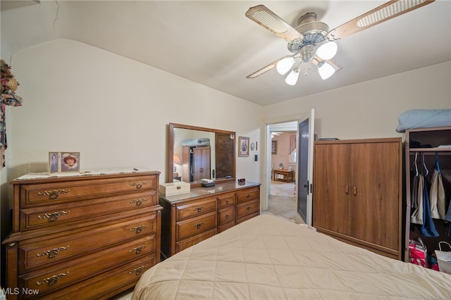 bedroom with vaulted ceiling and ceiling fan