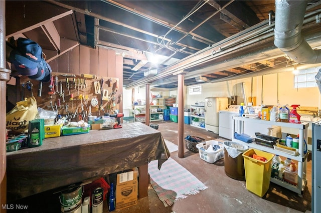 basement with washing machine and clothes dryer