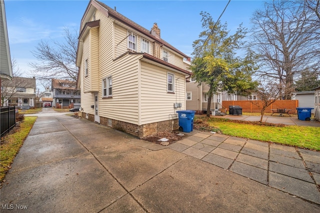 rear view of house with a patio area