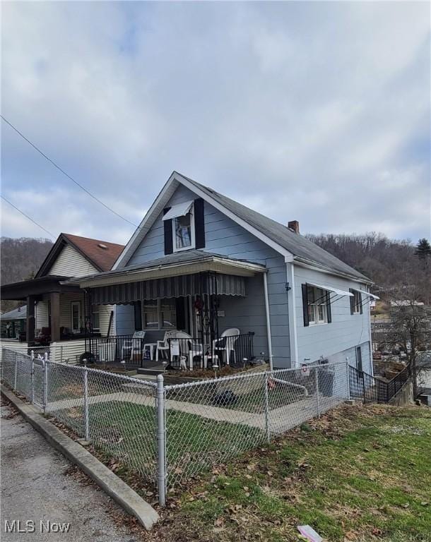 bungalow-style home featuring covered porch