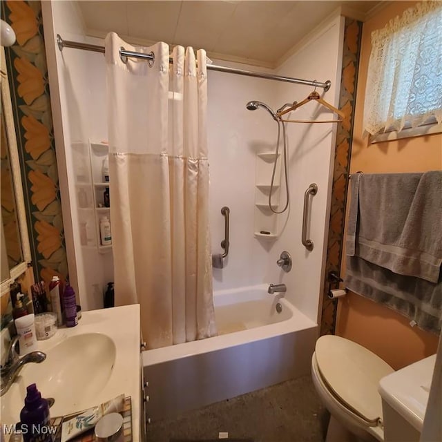 full bathroom featuring shower / tub combo, toilet, and sink