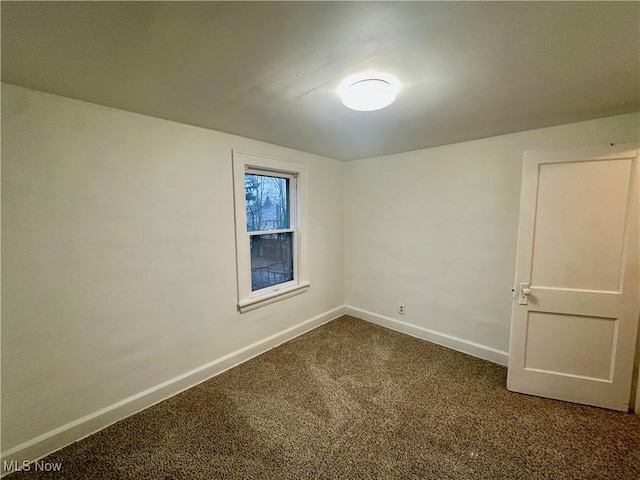 unfurnished room featuring carpet floors