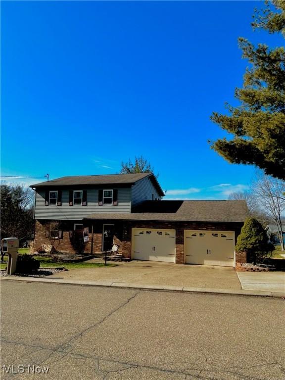 view of front of home with a garage