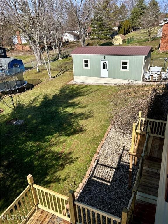 130 Rauch Dr, Marietta, OH 45750 - view of yard featuring an outbuilding and a trampoline