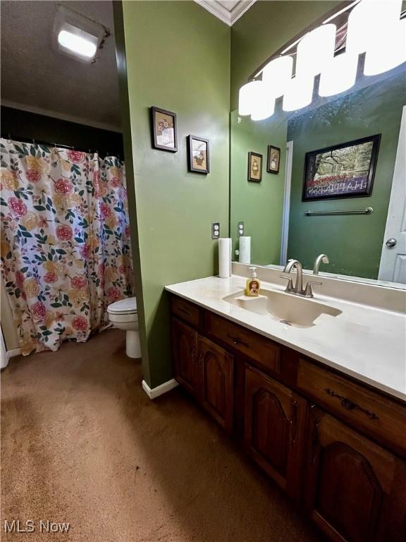 130 Rauch Dr, Marietta, OH 45750 - bathroom featuring vanity, crown molding, a shower with curtain, and toilet