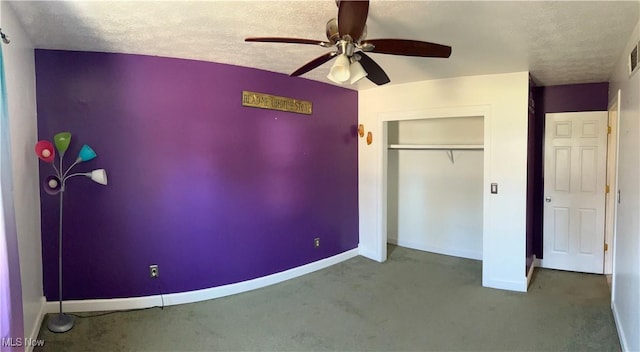 130 Rauch Dr, Marietta, OH 45750 - unfurnished bedroom with ceiling fan, carpet floors, a closet, and a textured ceiling