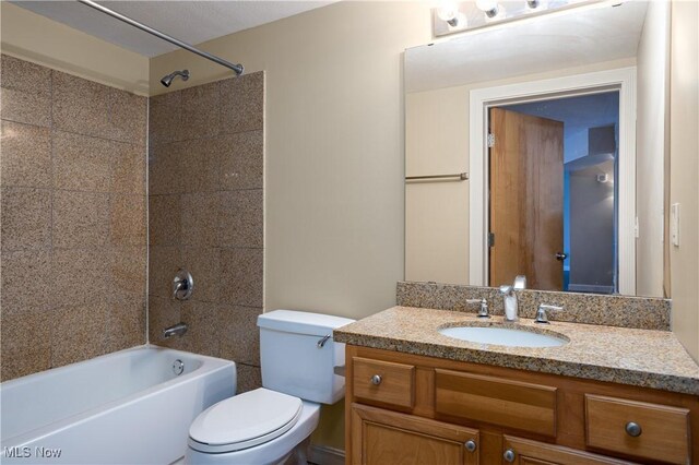 full bathroom with toilet, bathtub / shower combination, and vanity