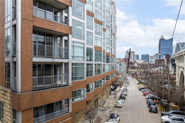 view of property with a city view