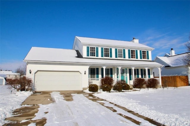 view of front of home featuring a garage and covered porch