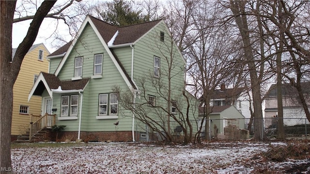 view of snow covered property