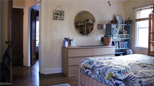 bedroom featuring dark hardwood / wood-style flooring