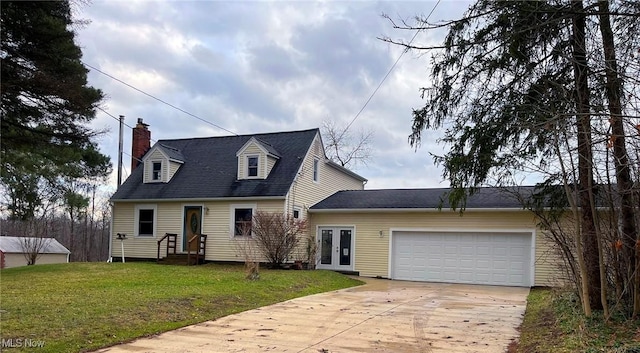 cape cod-style house featuring a garage, a front lawn, and french doors