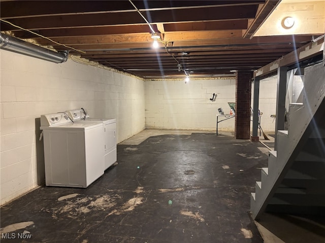 basement featuring washing machine and dryer