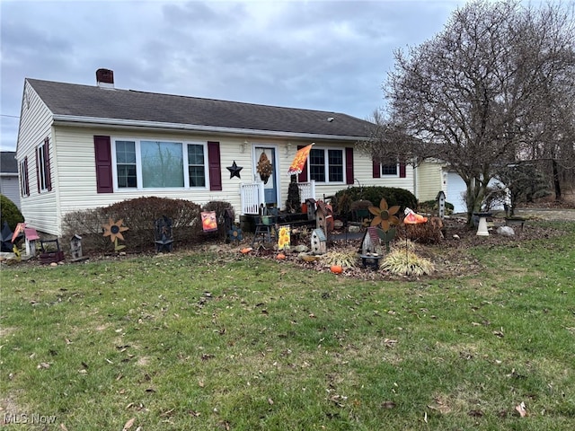 single story home with a front lawn