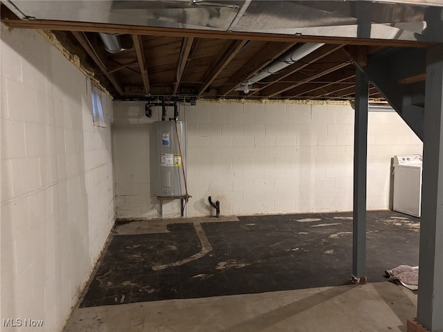 basement with washer / dryer and electric water heater