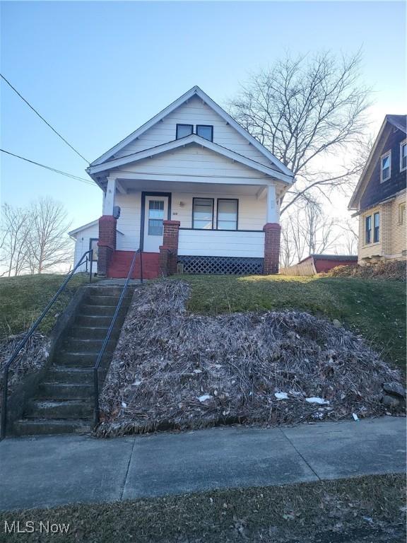 view of front facade featuring covered porch