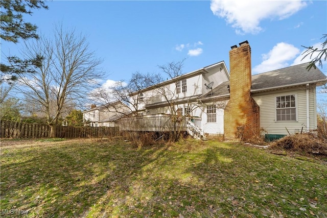 34210 Beacon Dr, Willoughby, OH 44094 - rear view of property with a wooden deck and a lawn