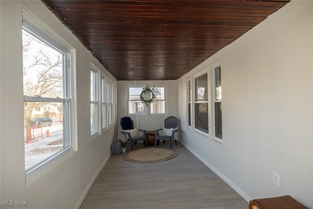 sunroom with wood ceiling