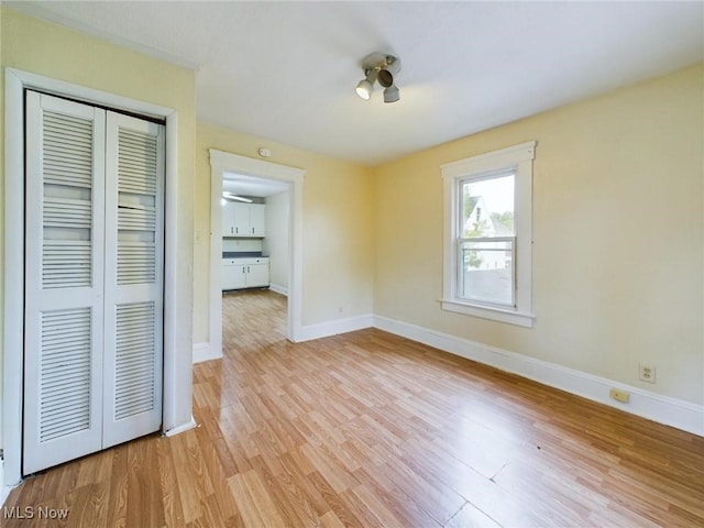 unfurnished dining area featuring light hardwood / wood-style flooring