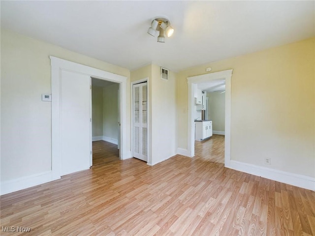 empty room featuring light wood-type flooring