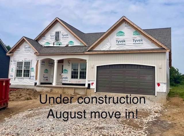 3177 Azalea Ridge Rd, Perry, OH 44081 - property under construction featuring covered porch, an attached garage, and roof with shingles