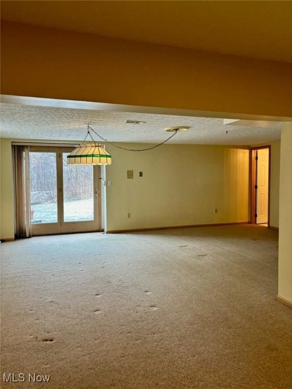 empty room with carpet flooring