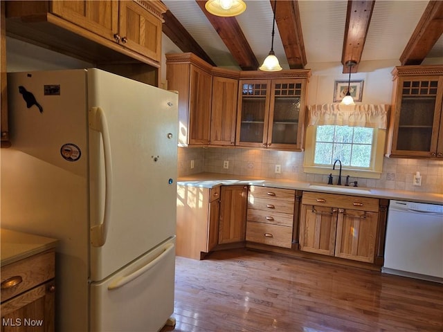 kitchen with sink, backsplash, hanging light fixtures, beam ceiling, and white appliances