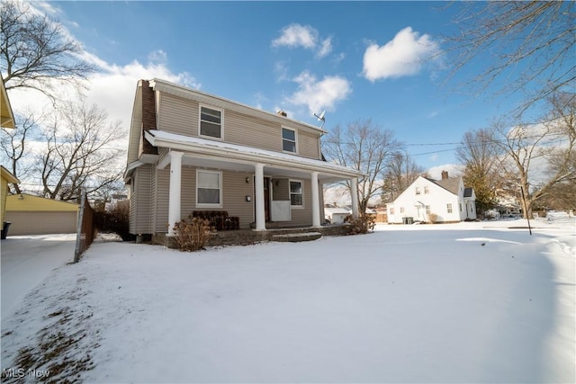 view of property featuring a porch