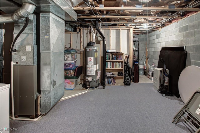 basement featuring heating unit and gas water heater