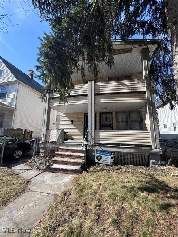 2786 E 119th St, Cleveland, OH 44120 - view of front of home with covered porch and fence