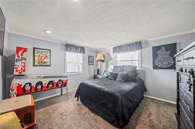 carpeted bedroom with ornamental molding and a textured ceiling