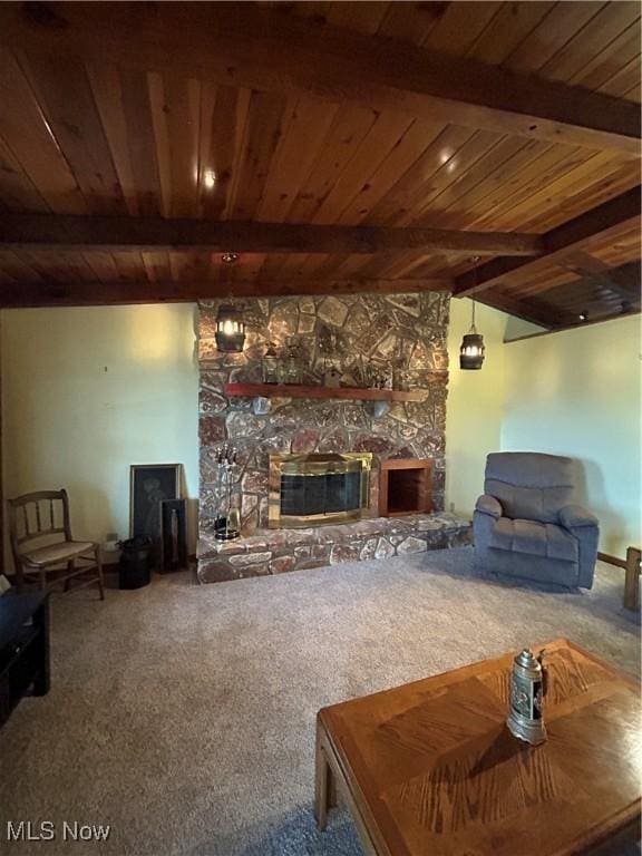 carpeted living room with a fireplace, wooden ceiling, and beamed ceiling