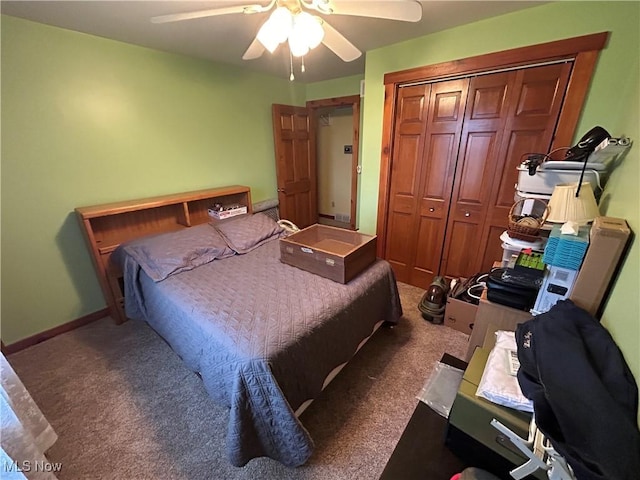 carpeted bedroom with a closet and ceiling fan