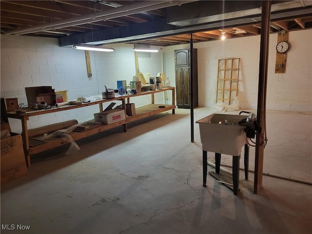 basement with a workshop area