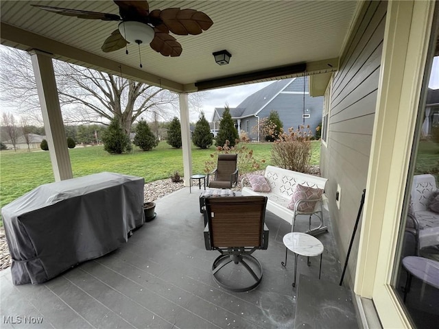 view of patio with grilling area, outdoor lounge area, and ceiling fan